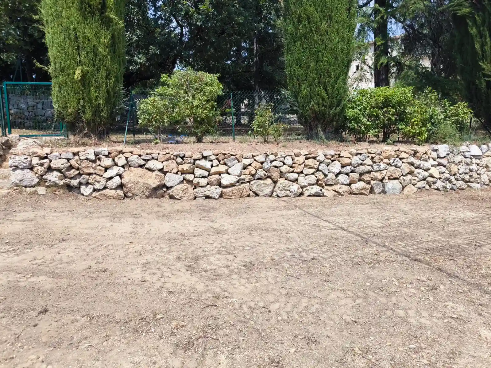 Mur de restanque en pierre sèche par JM Services